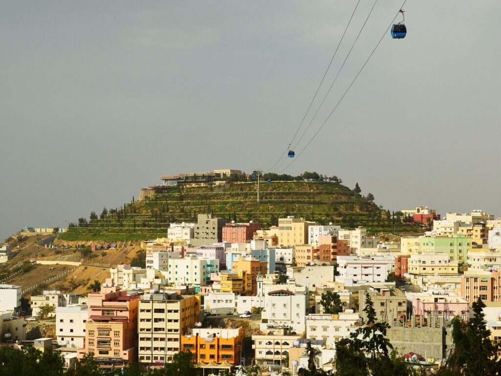 Journey to the captivating city of Abha, nestled amidst the majestic peaks of Saudi Arabia's southwestern highlands. Abha invites you with its cooler climate, a welcome respite from the desert heat. Immerse yourself in the rich tapestry of Abha's culture, from the bustling energy of its souqs overflowing with local crafts and spices, to the serene beauty of its historical sites.